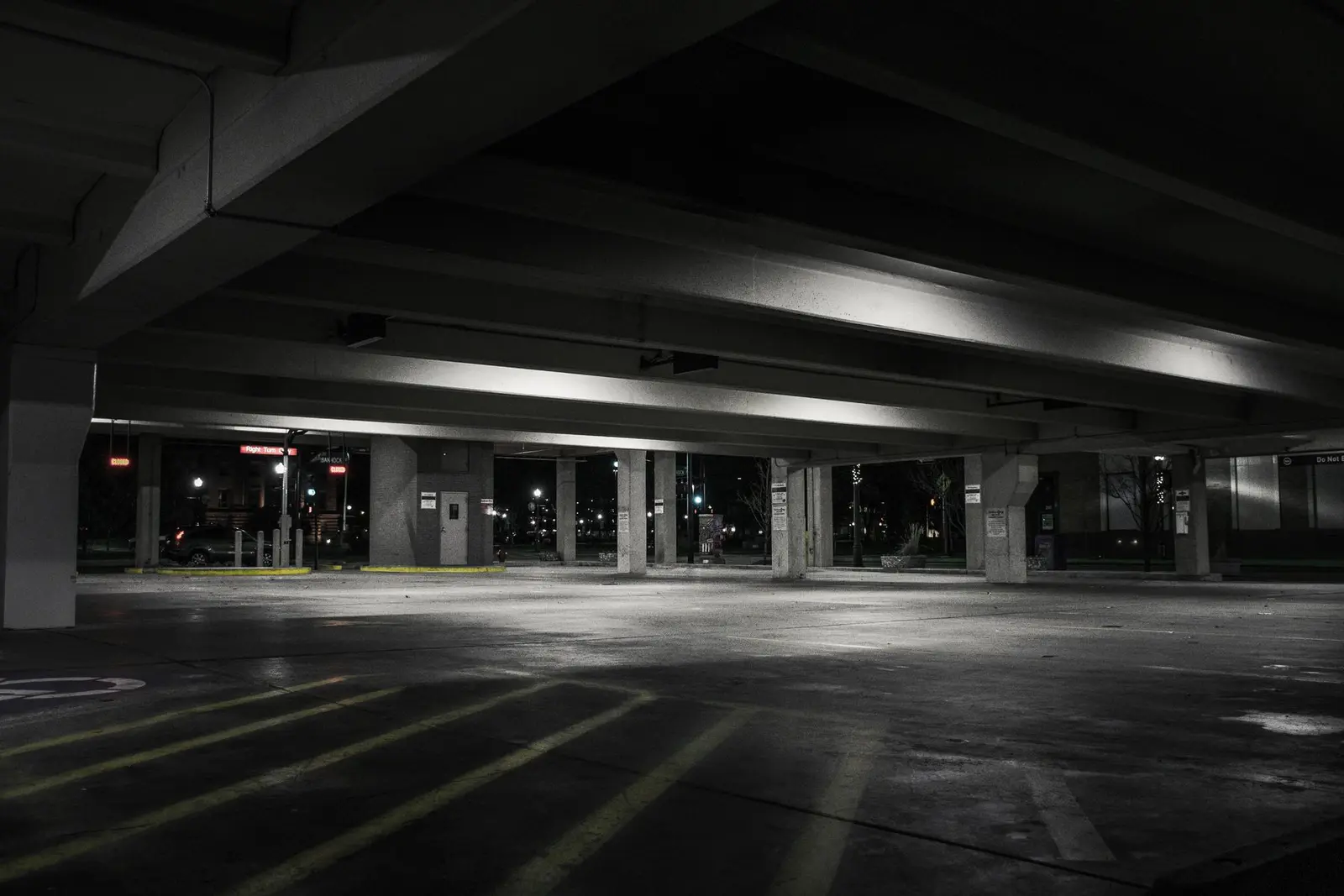 An empty parking garage at night